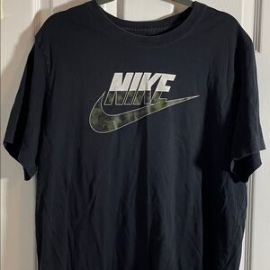 Nike Men's Black Tee with Green Camouflage Logo